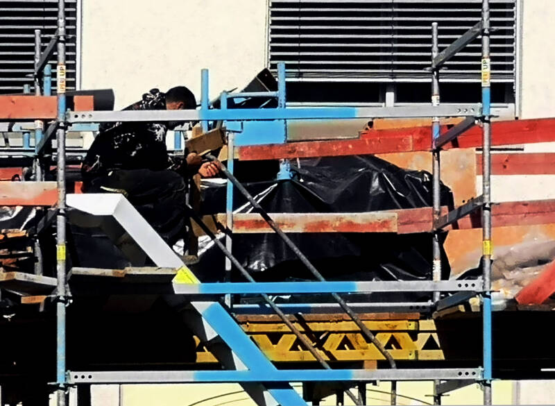 “A book in hand, or merely a board before one’s head?”