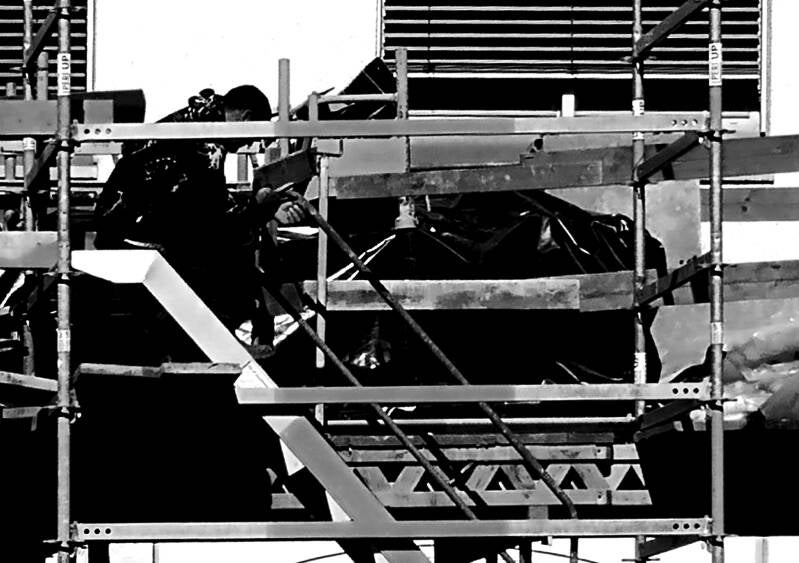 “A book in hand, or merely a board before one’s head?” BW