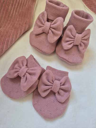 Slofjes ajour pointelle met strik *Licht mauve*