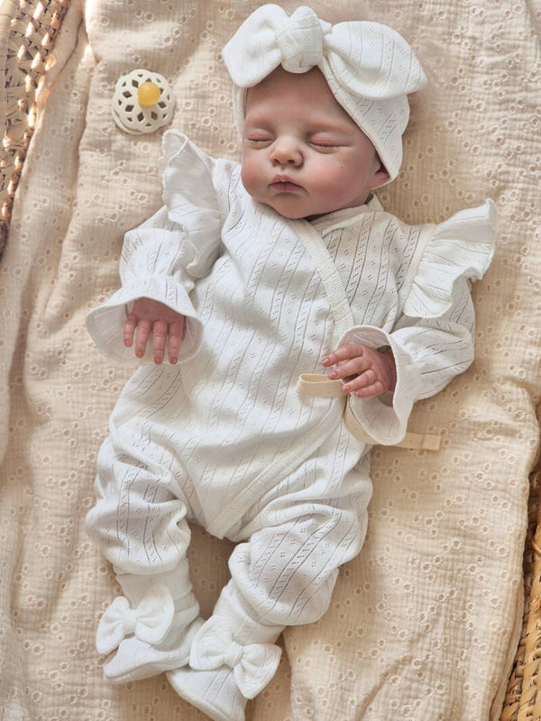 Boxpakje ajour pointelle strepen off-white met ruffle mouwen.