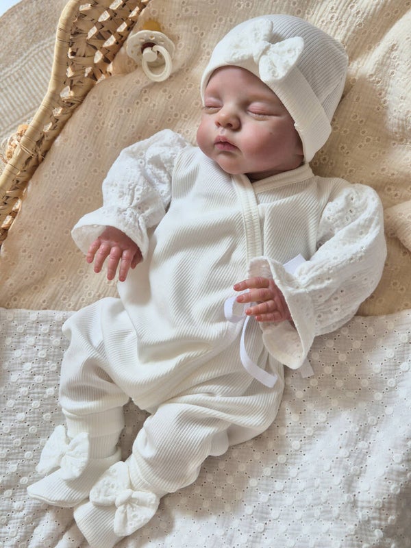 Boxpakje met broderie pofmouwen gerib off white.