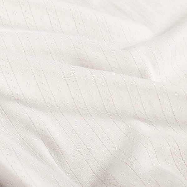 Turbanmutsje ajour pointelle strepen MET STRIK off white.