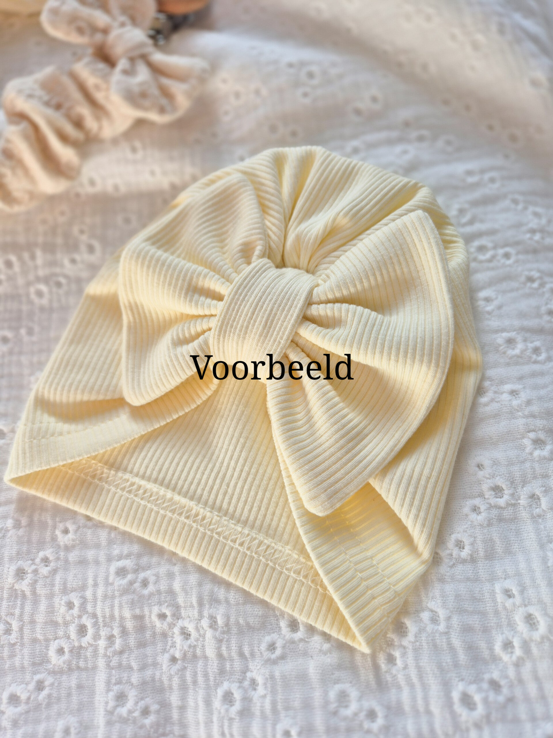 Turbanmutsje met strik rib *Pastelroze*