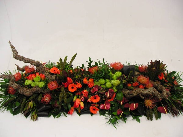 Rouwarrangement oranje 01