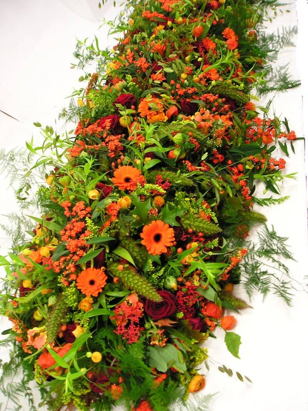 Rouwarrangement oranje 02