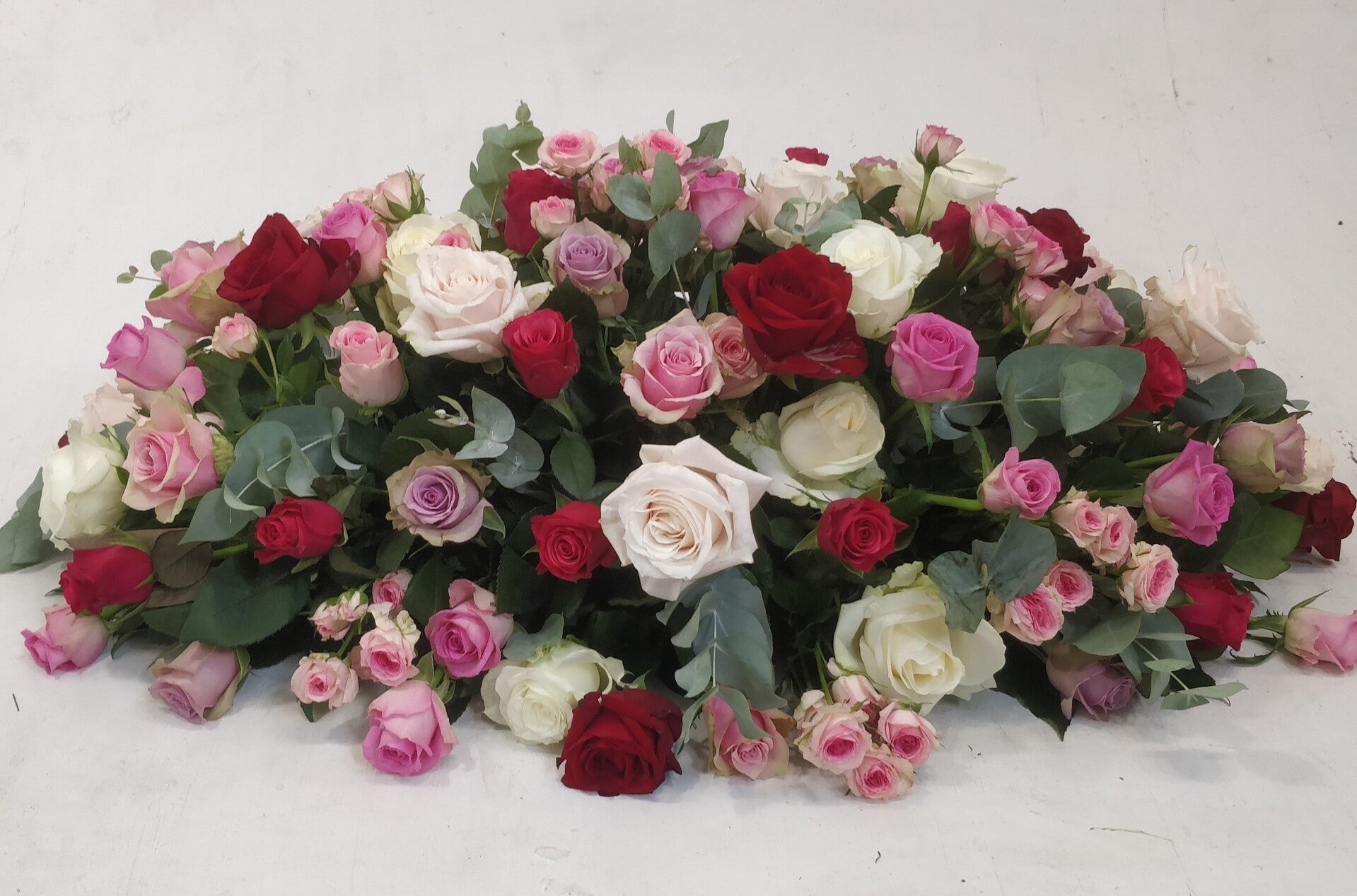Rouwarrangement roze 01