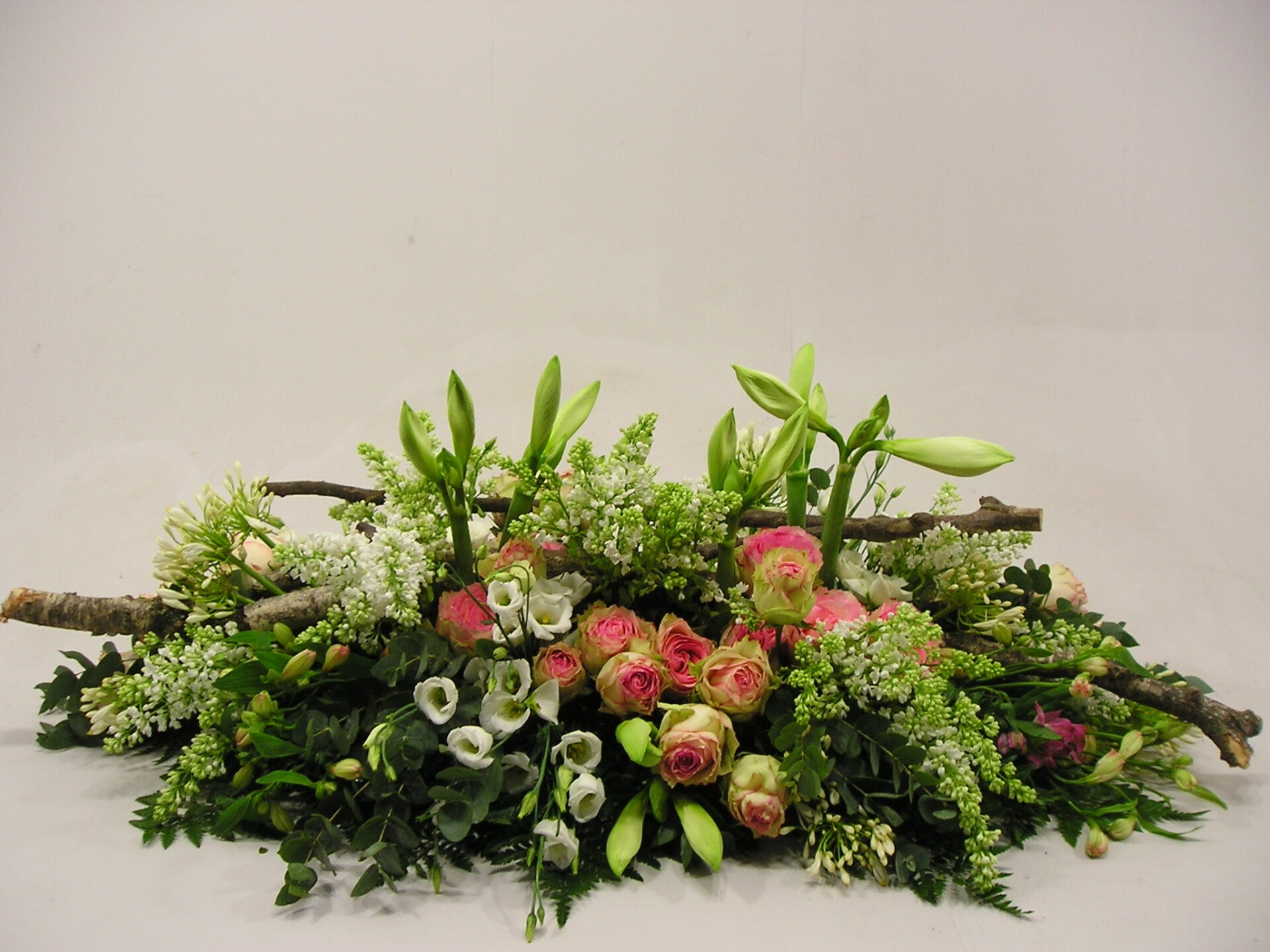 Rouwarrangement roze 04