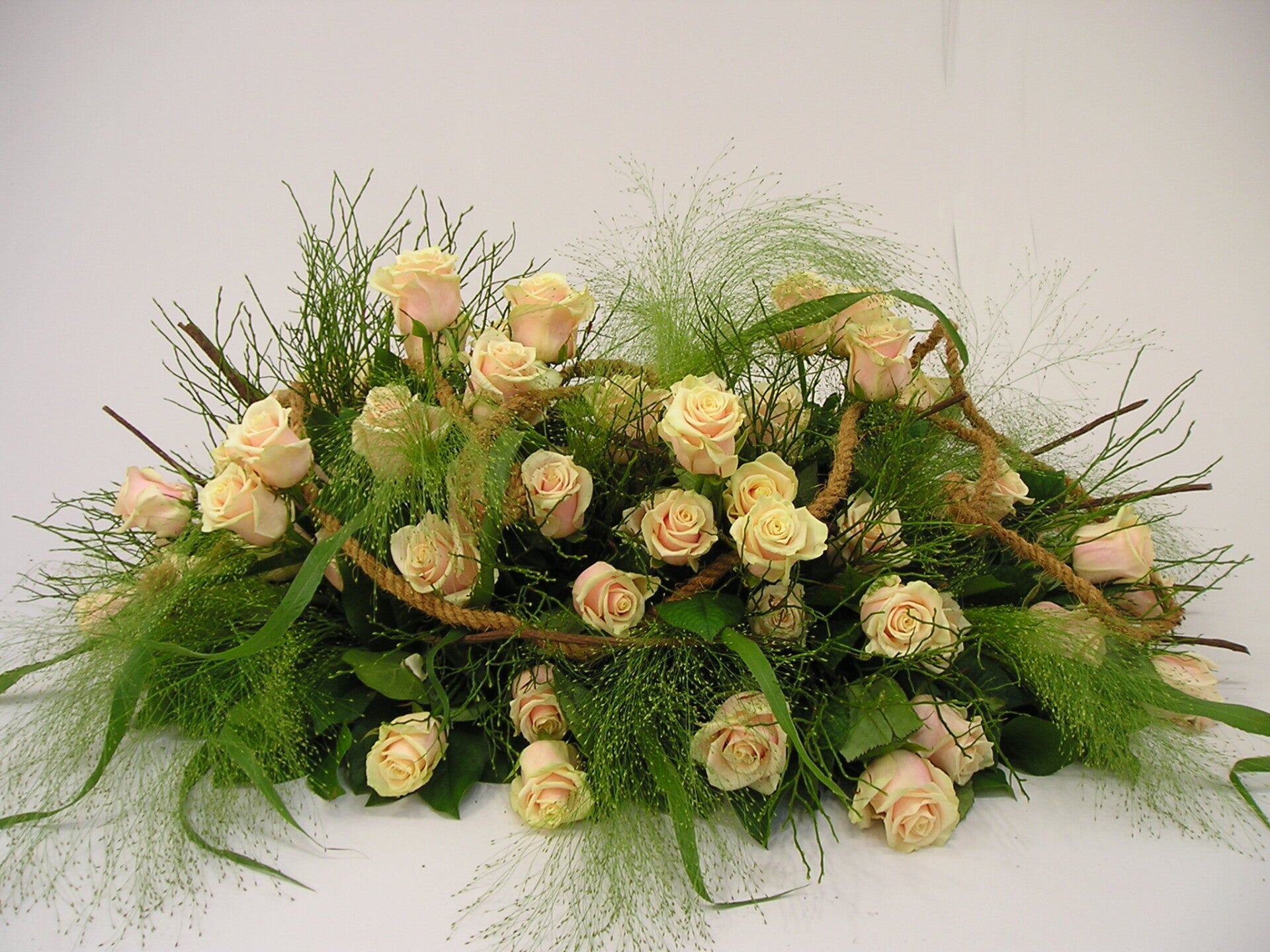 Rouwarrangement roze 05