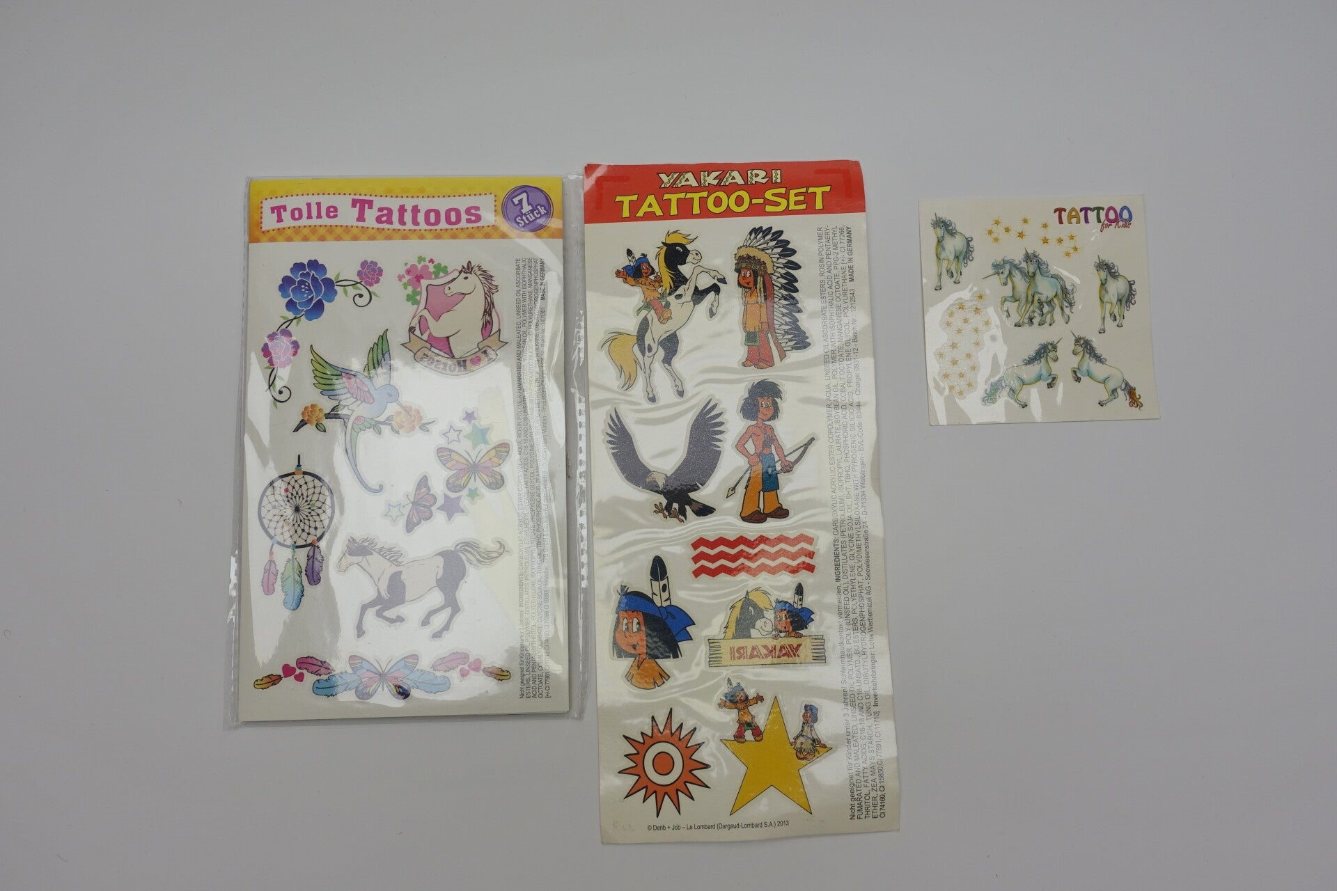 Diverse ältere Kindertattoos als Bastelprojekte