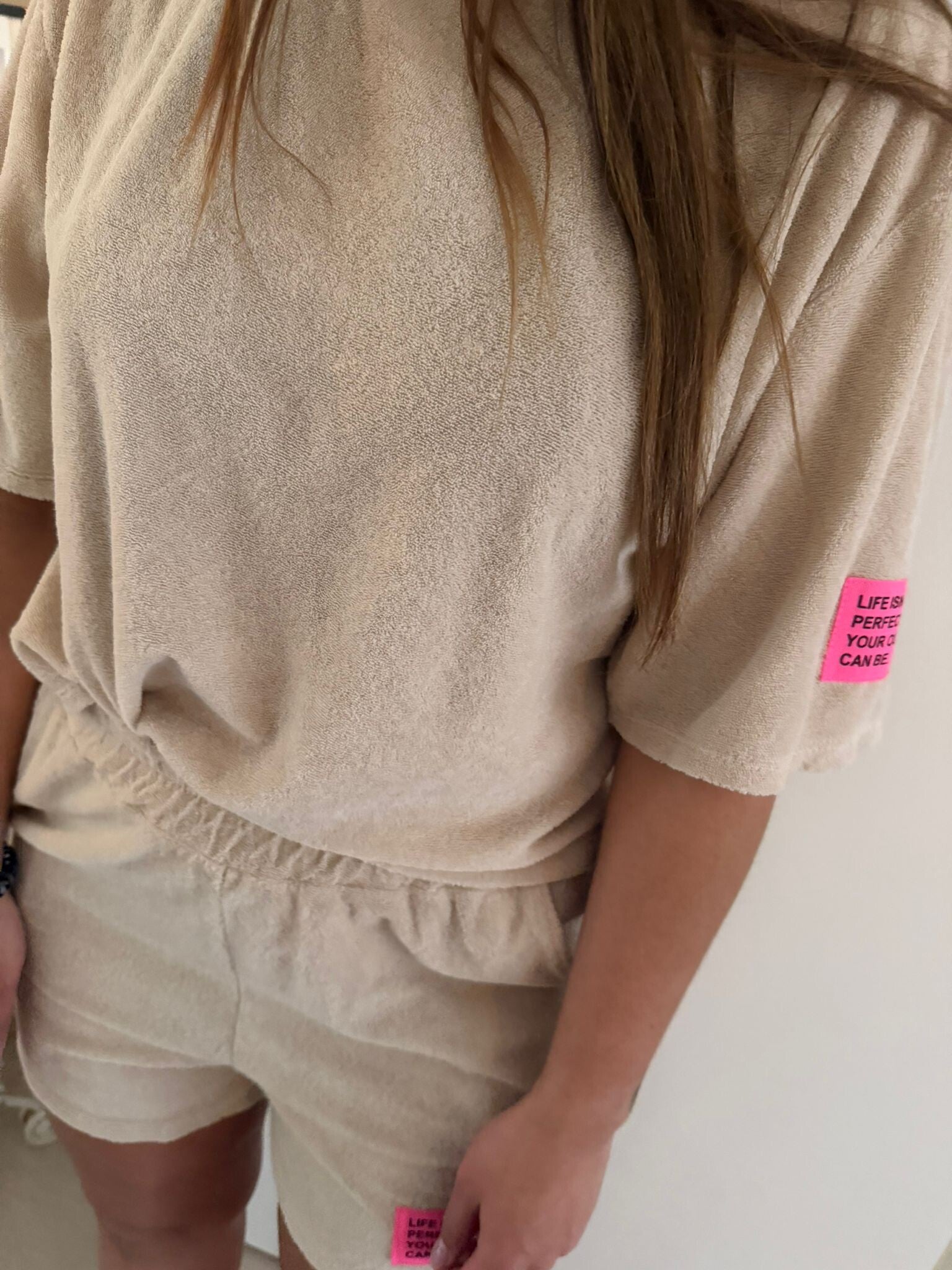 Co ord set - Beige met roze embleem