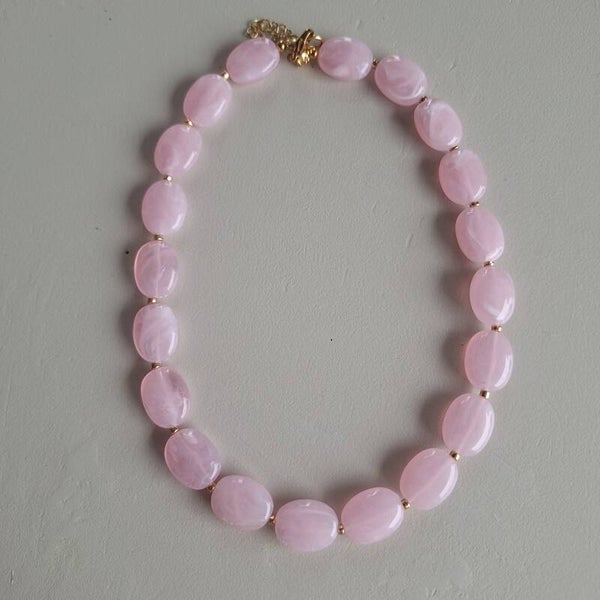 Lichtroze ovale kralen ketting