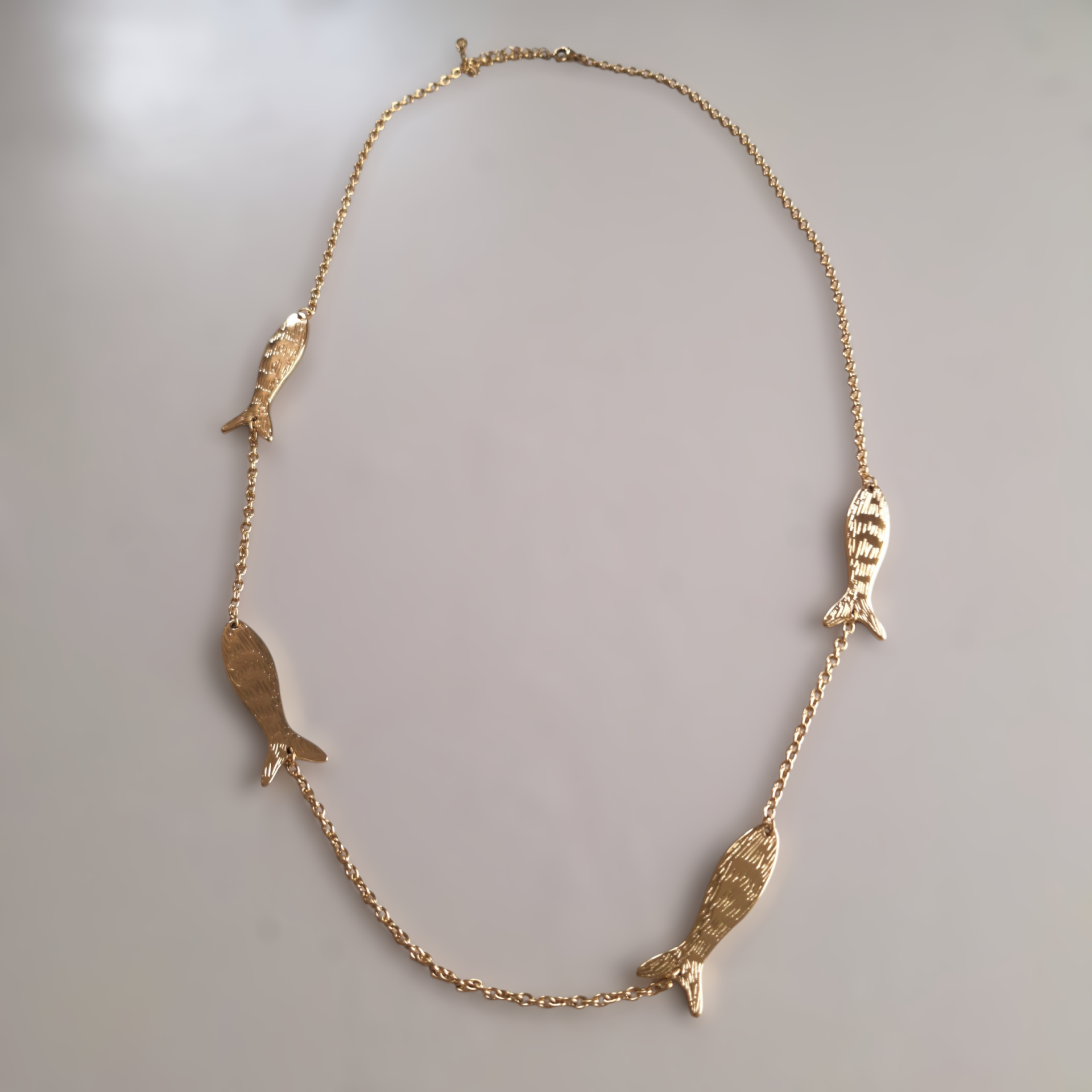 Mega lange goudkleurige vissen ketting