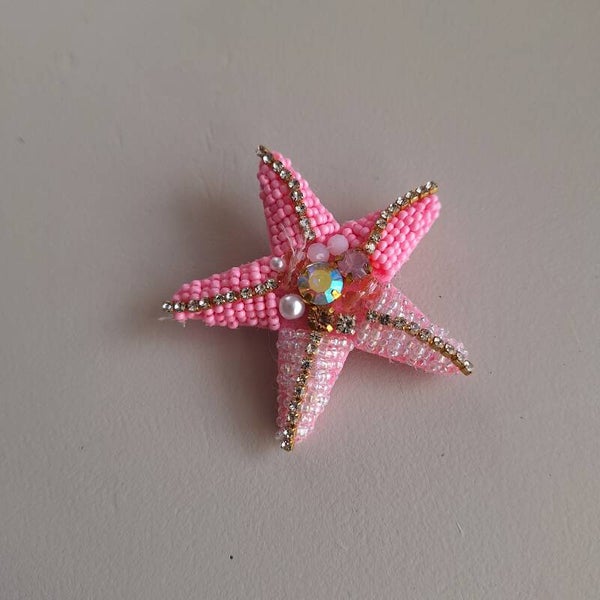 Broche roze zeester