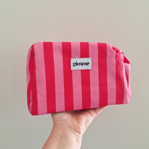 Roze streep toilettas