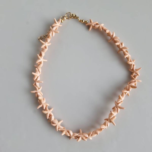 Zalmkleurige zeester ketting