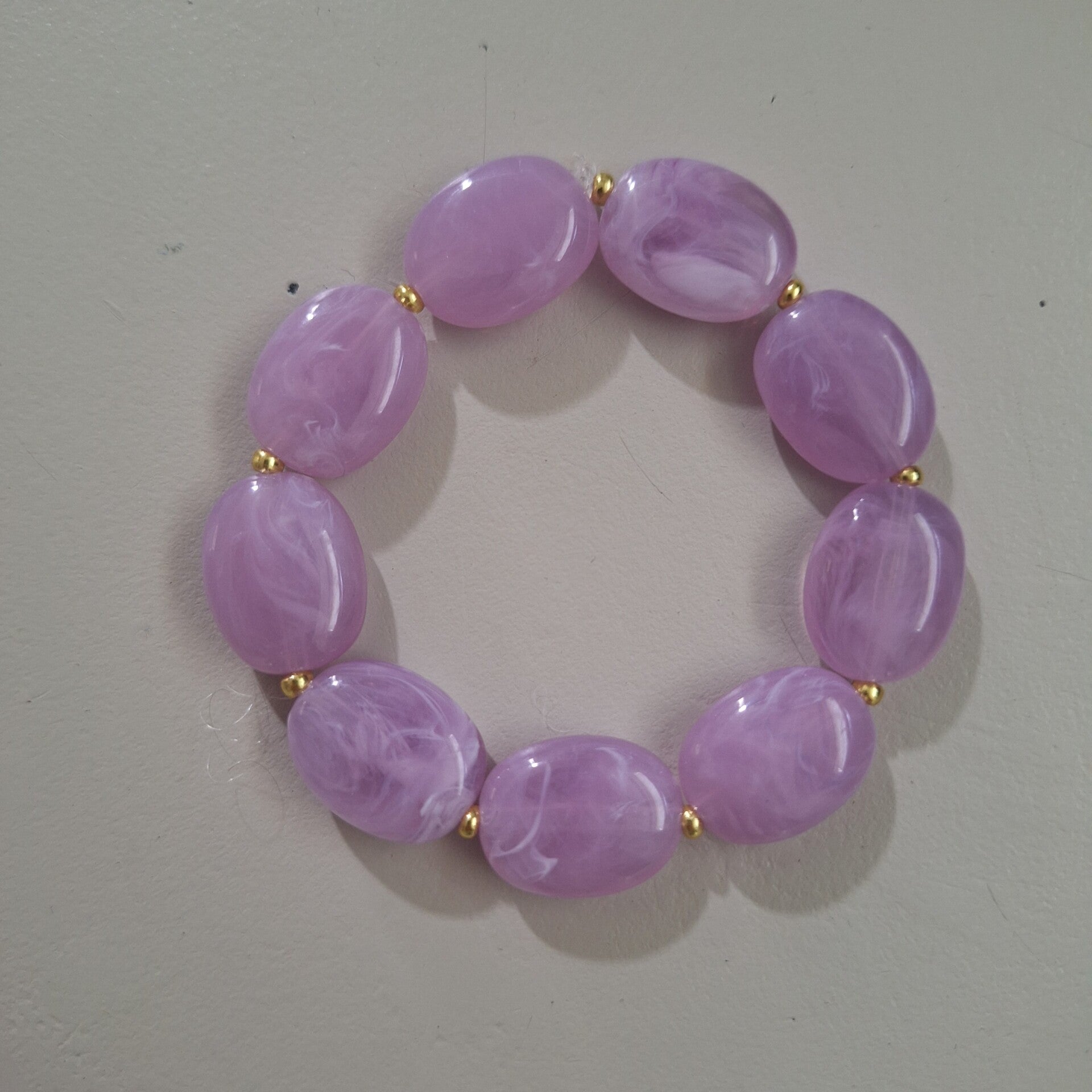 Lila ovale kralen armband M