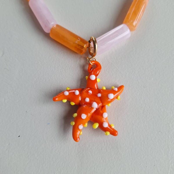 Oranje zeester bedel