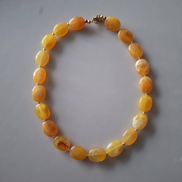 Gele ovale kralen ketting