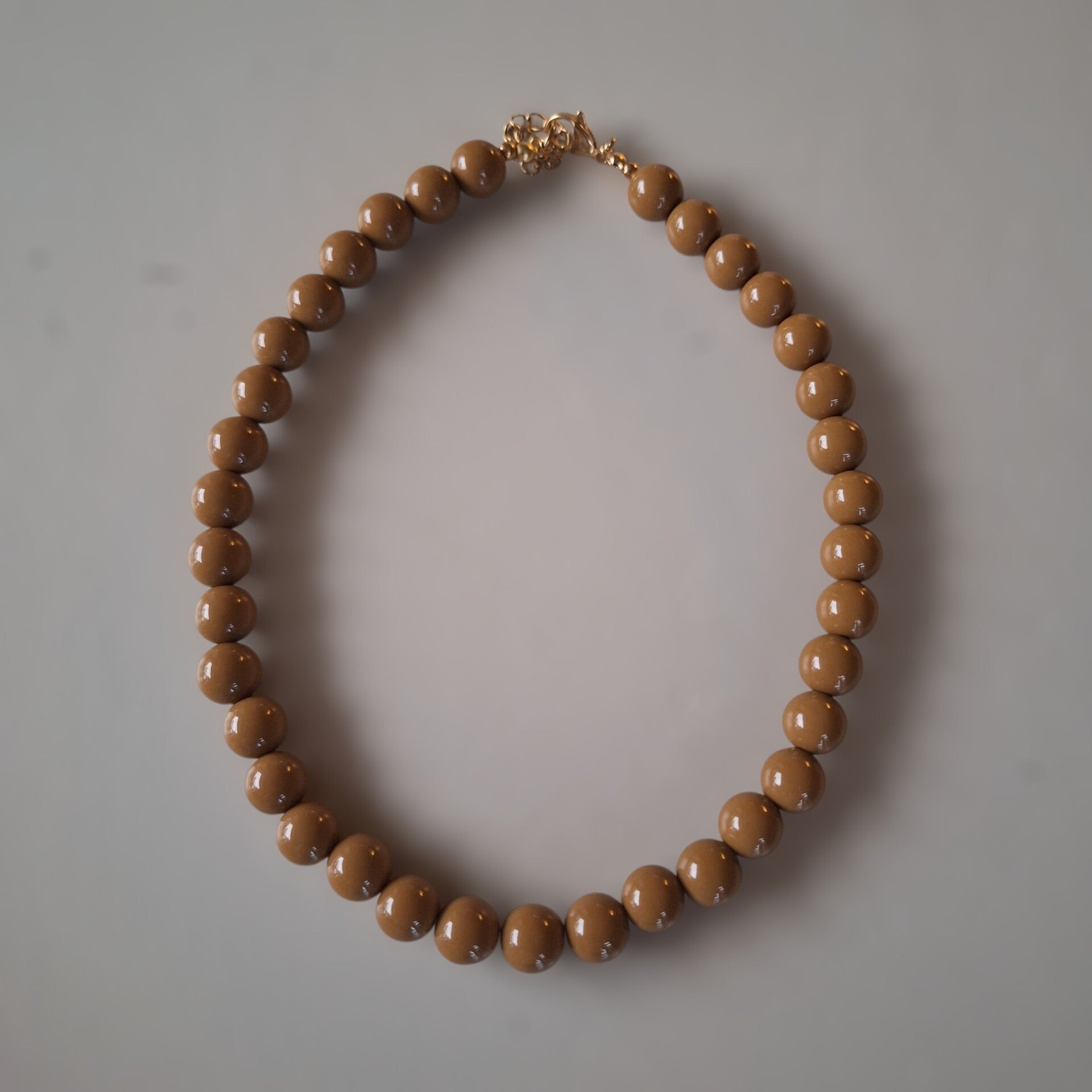 Camel / olijf bollen ketting
