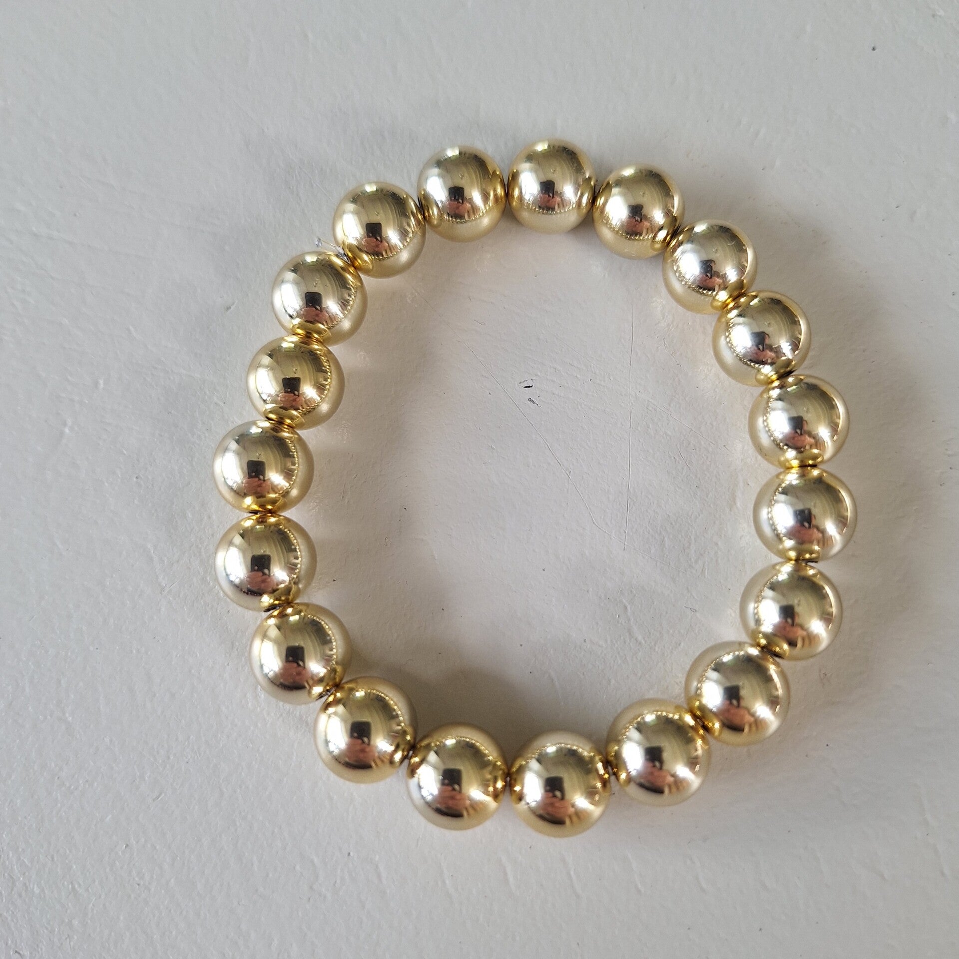 Goudkleurige armband M