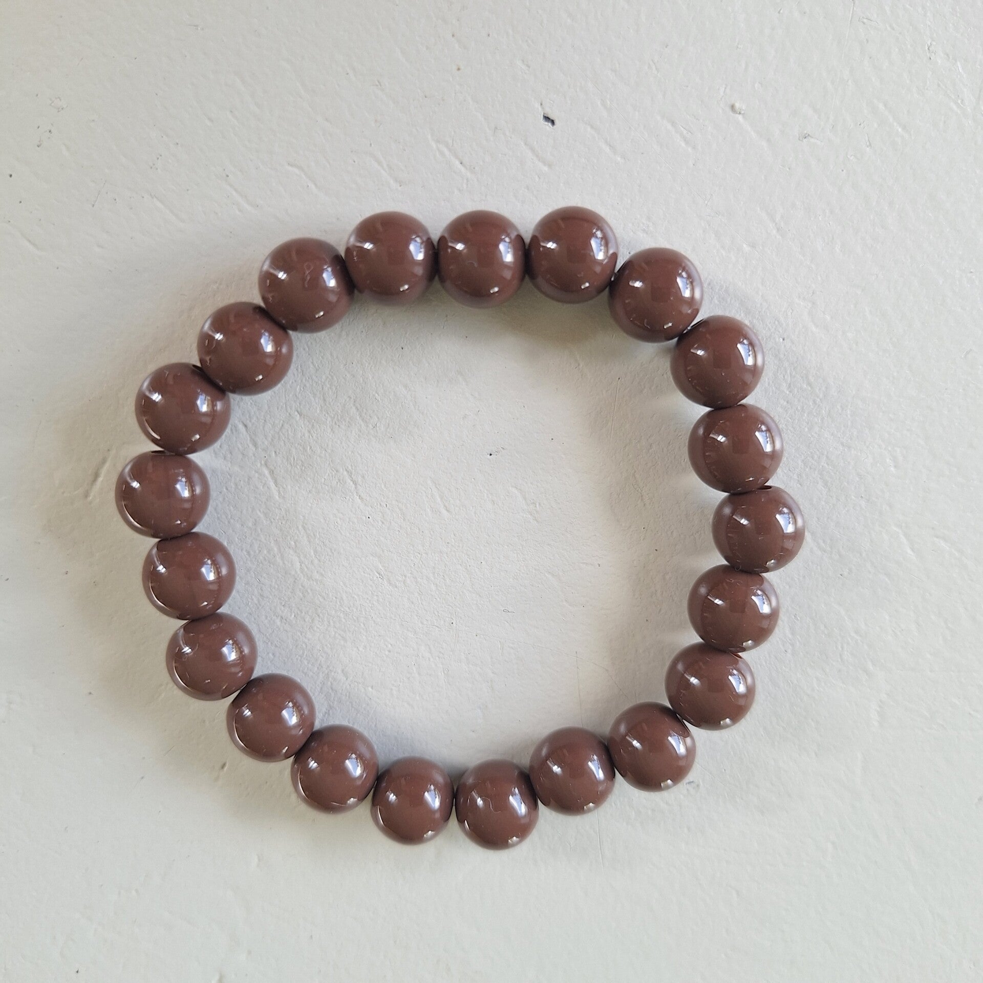 Bruine bollen armband M