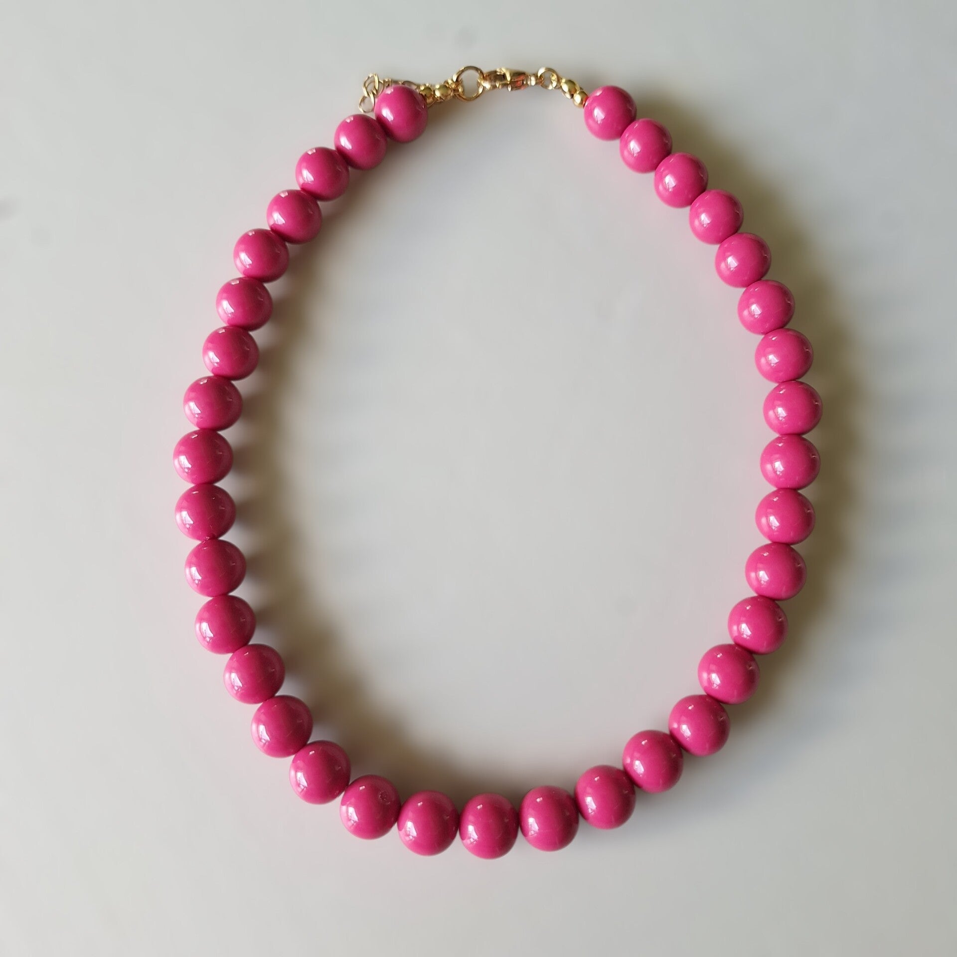 Roze bollen ketting
