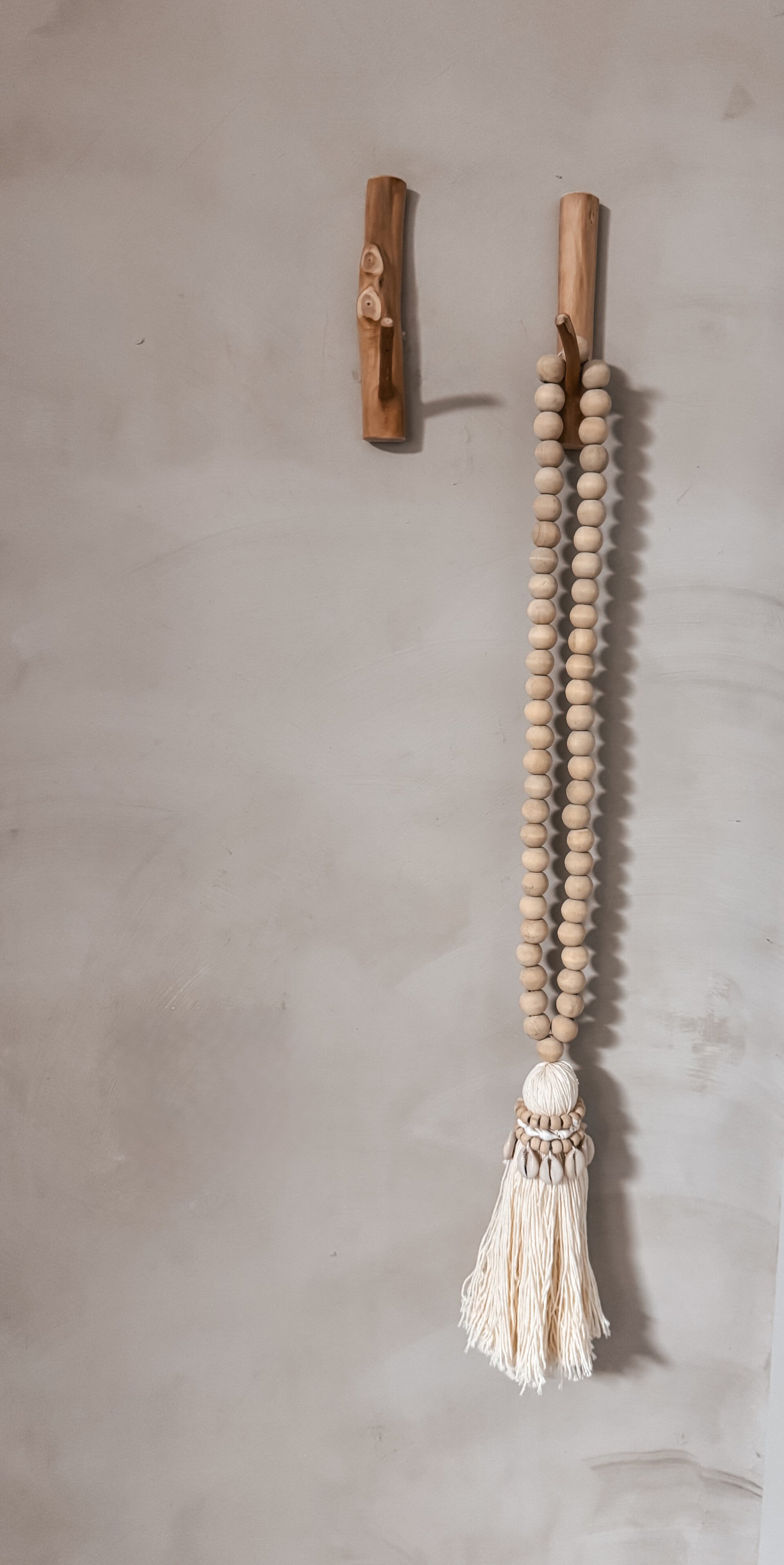 Ketting met kwast en schelpen