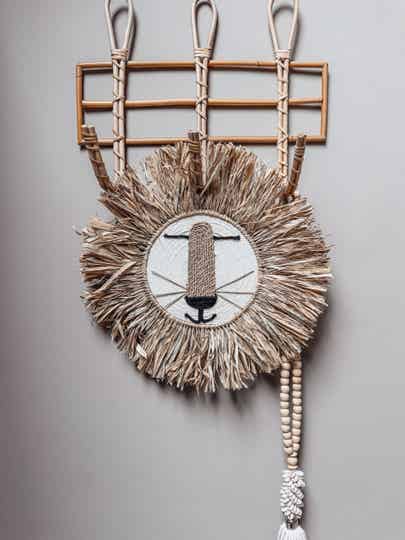 Wandhanger leeuw