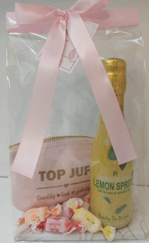 Toiletzakje, flesje lemon spritz en snoepjes
