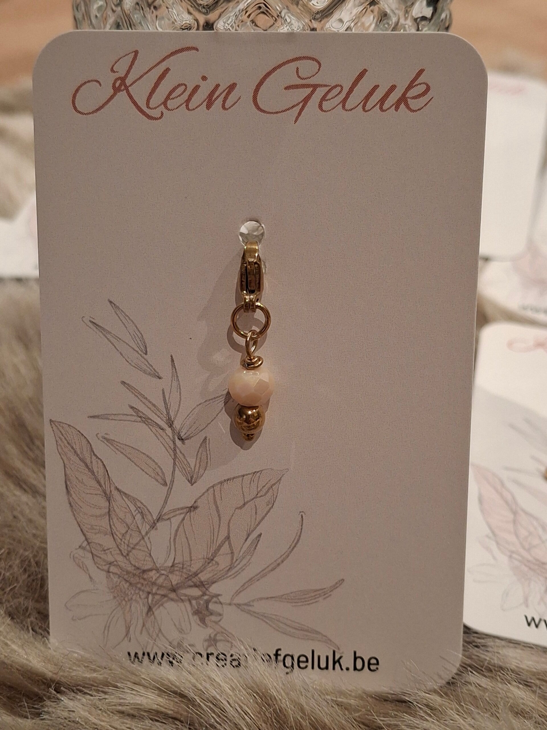 Stainless steel gold plated bedel met glaskraal