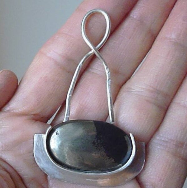 Pendentif original en argent avec une grande pyrite