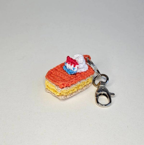Mini oranje tompouce sleutelhanger