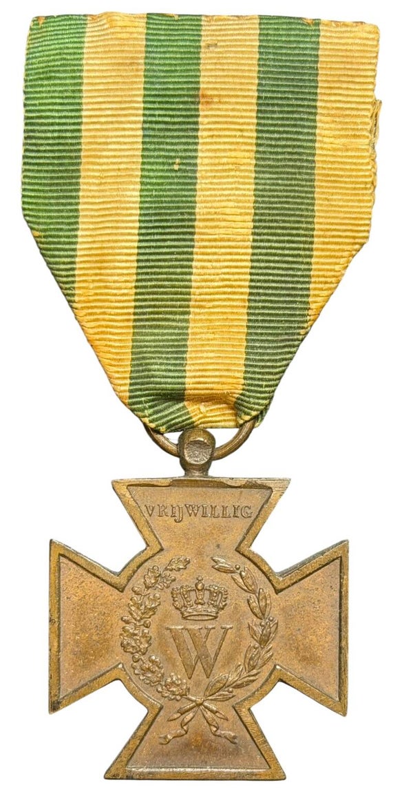 Dutch metal cross medal "Vrijwilliger"