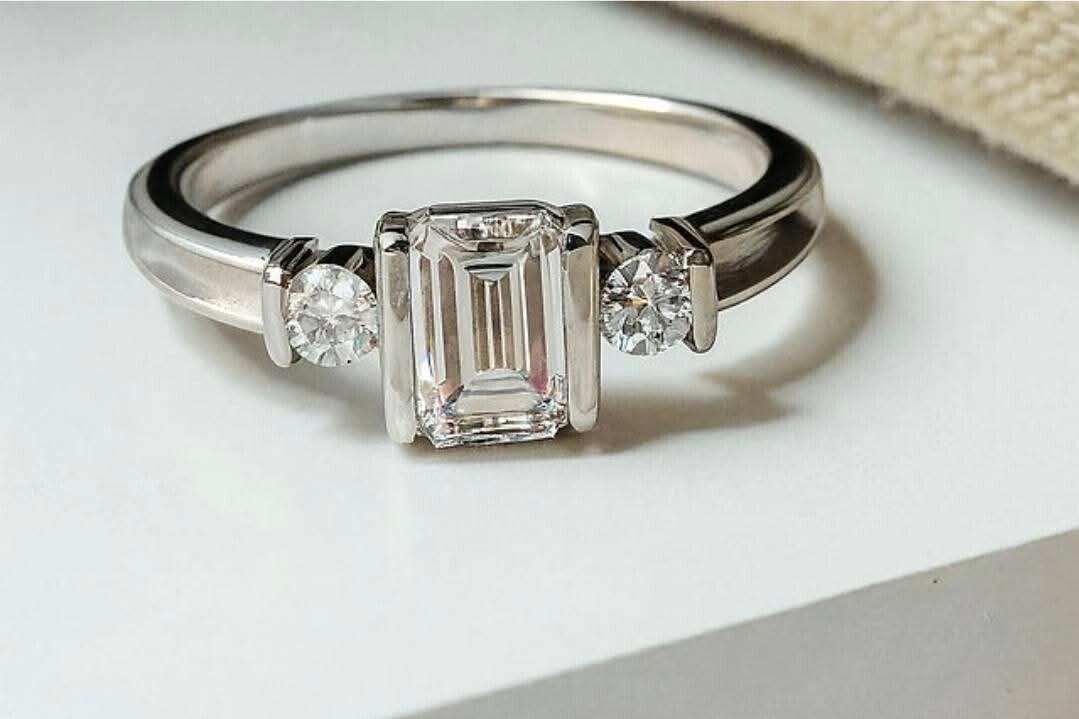 EMERALD CUT TRIPLE CZ BEZEL 925 SILVER RING