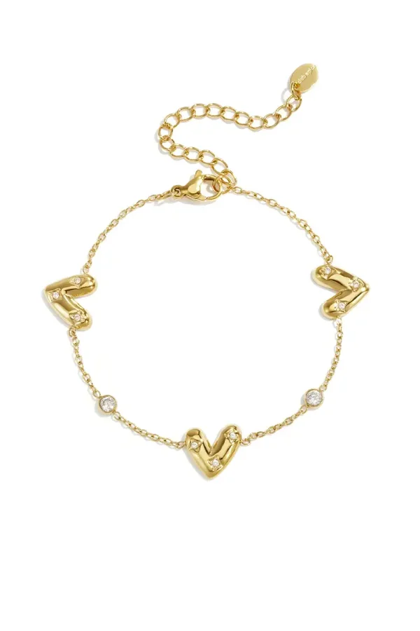 Armband met drie belegde hartjes goud