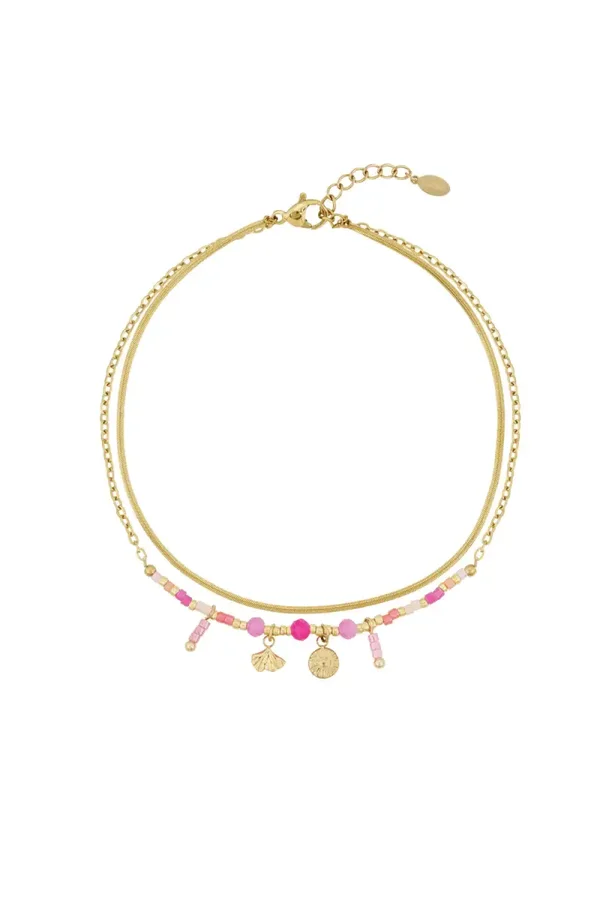 Enkelbandje met roze kraaltjes en bedeltjes goud