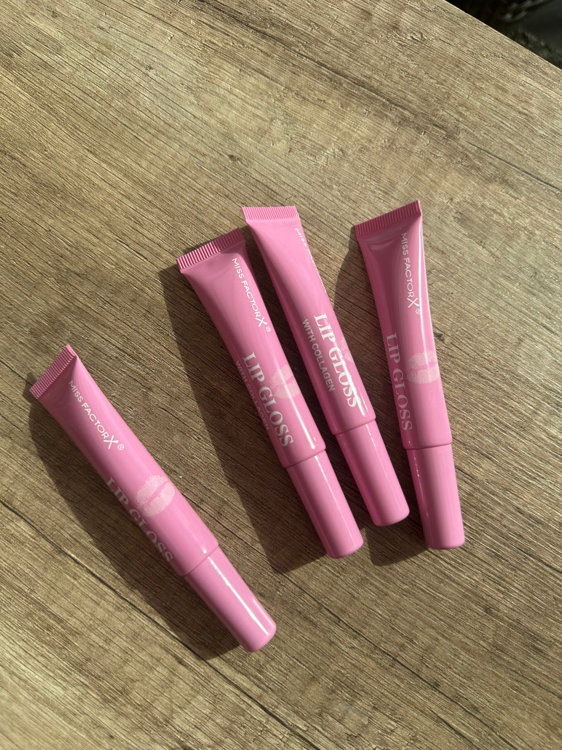 Lipgloss licht roze