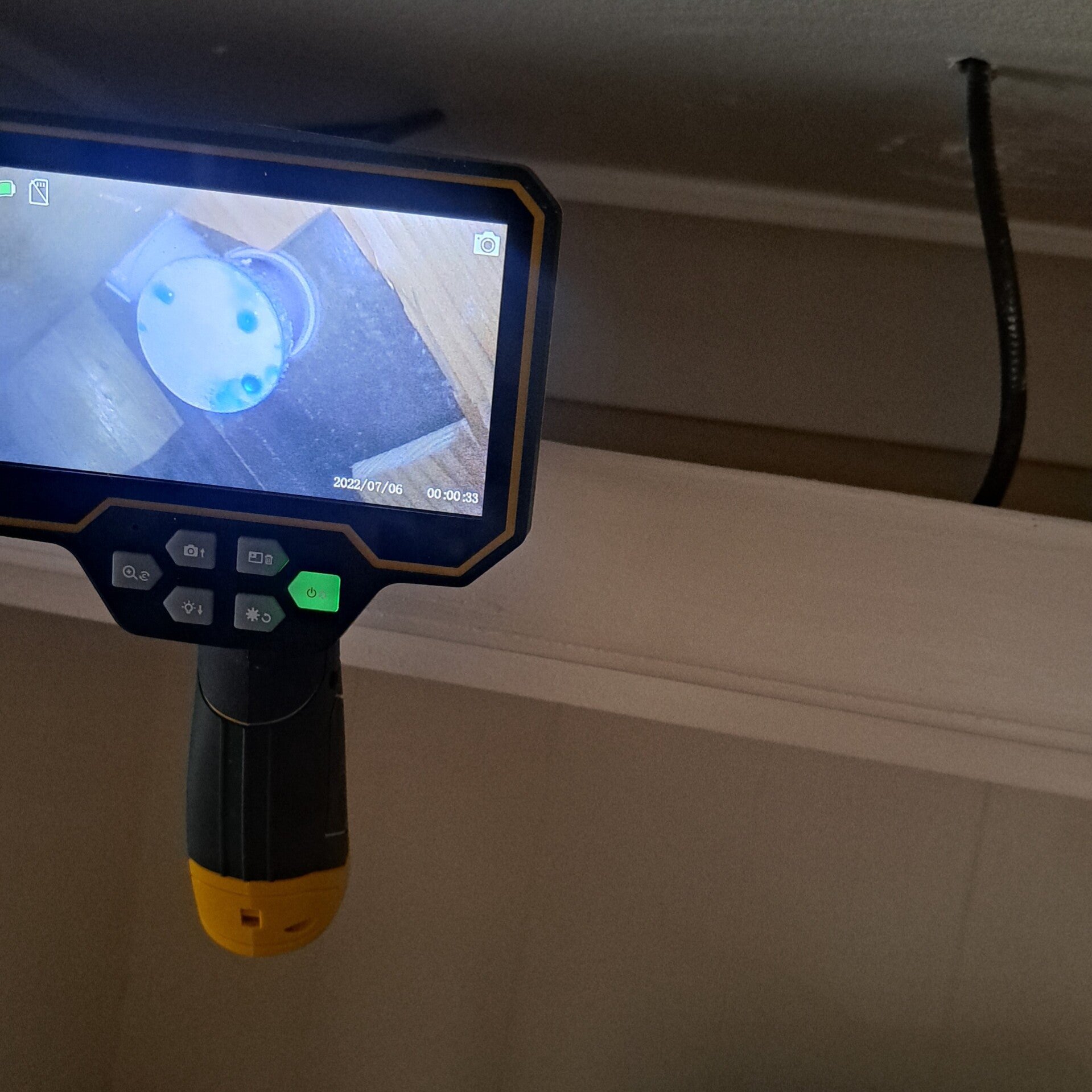 Shower trap leak detection in Dublin home showing dye leaking from trap