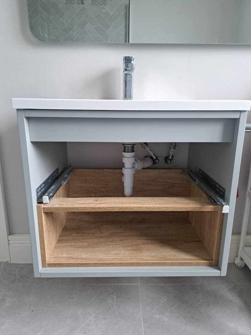 Vanity unit repaired and repiped after leak detection in Foxrock 