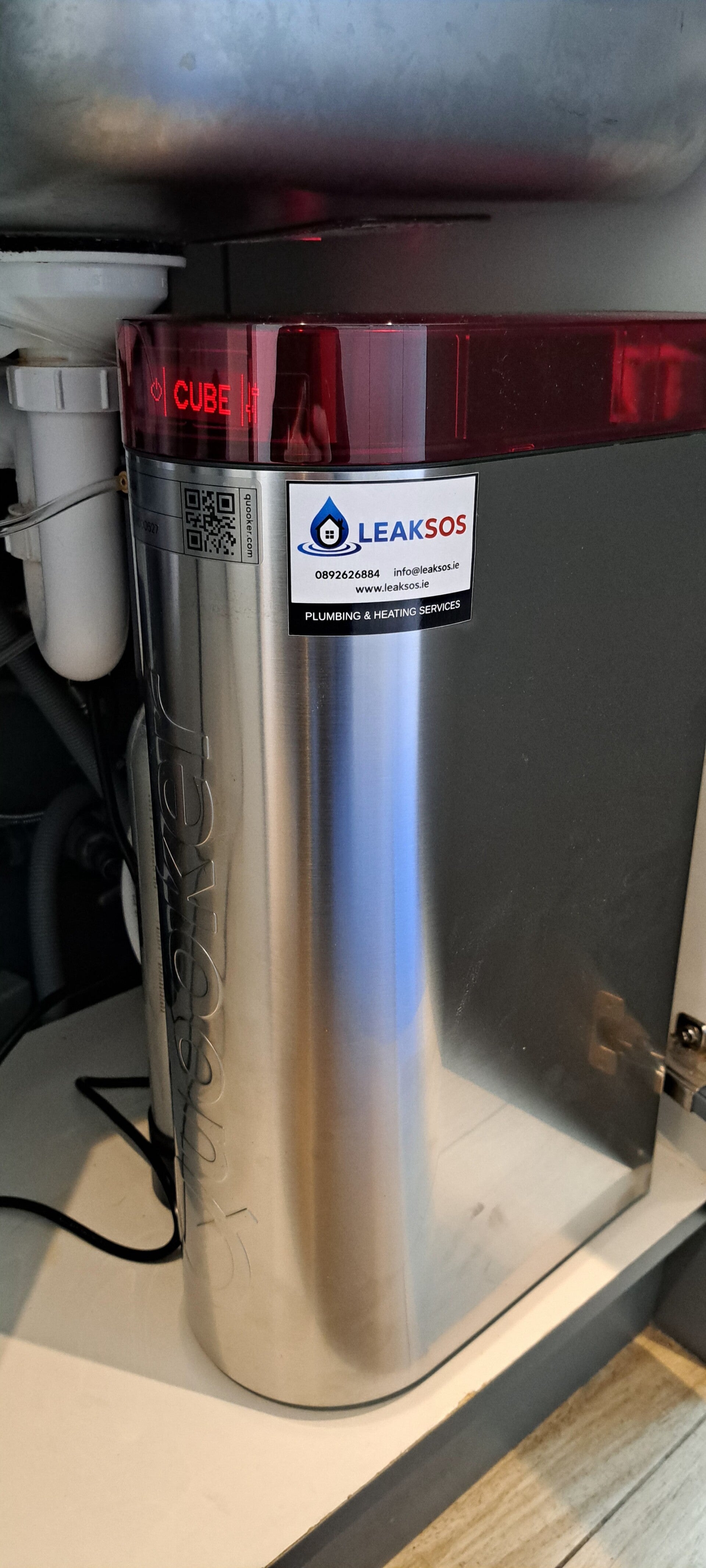 Quooker tap installation by LeakSOS in Dublin.  LeakSOS contact sticker on Quooker cube
