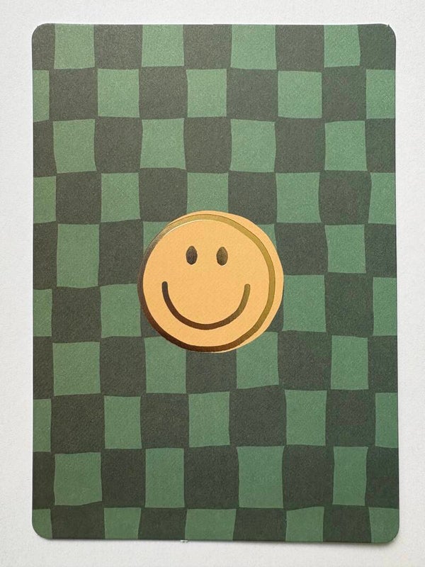 'Gouden smily' op groene kaart