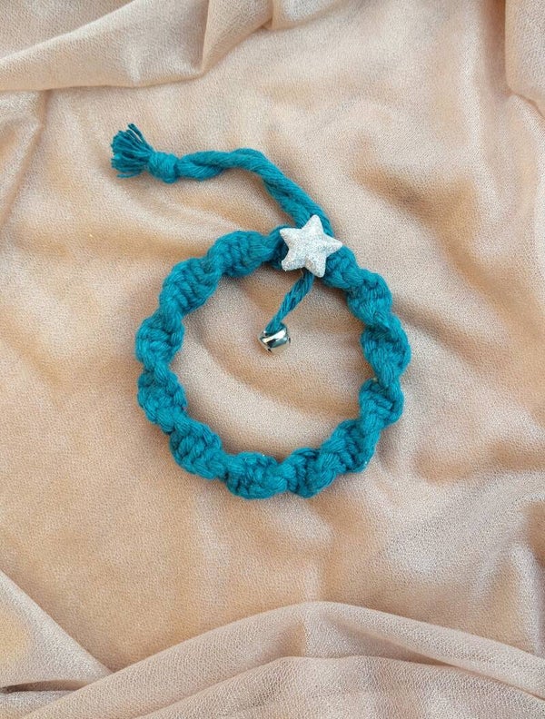 Ornament met bel en ster