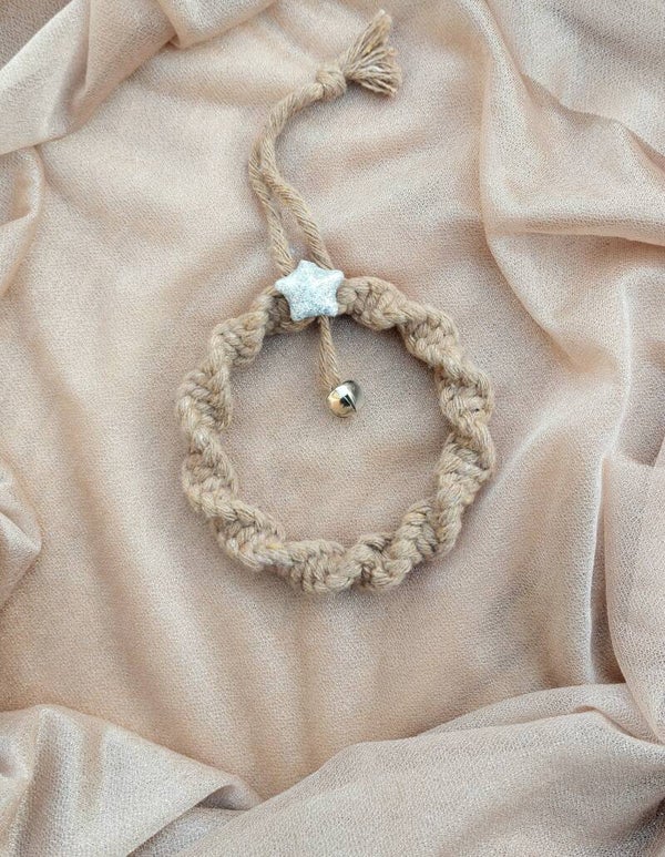 Ornament met bel en ster