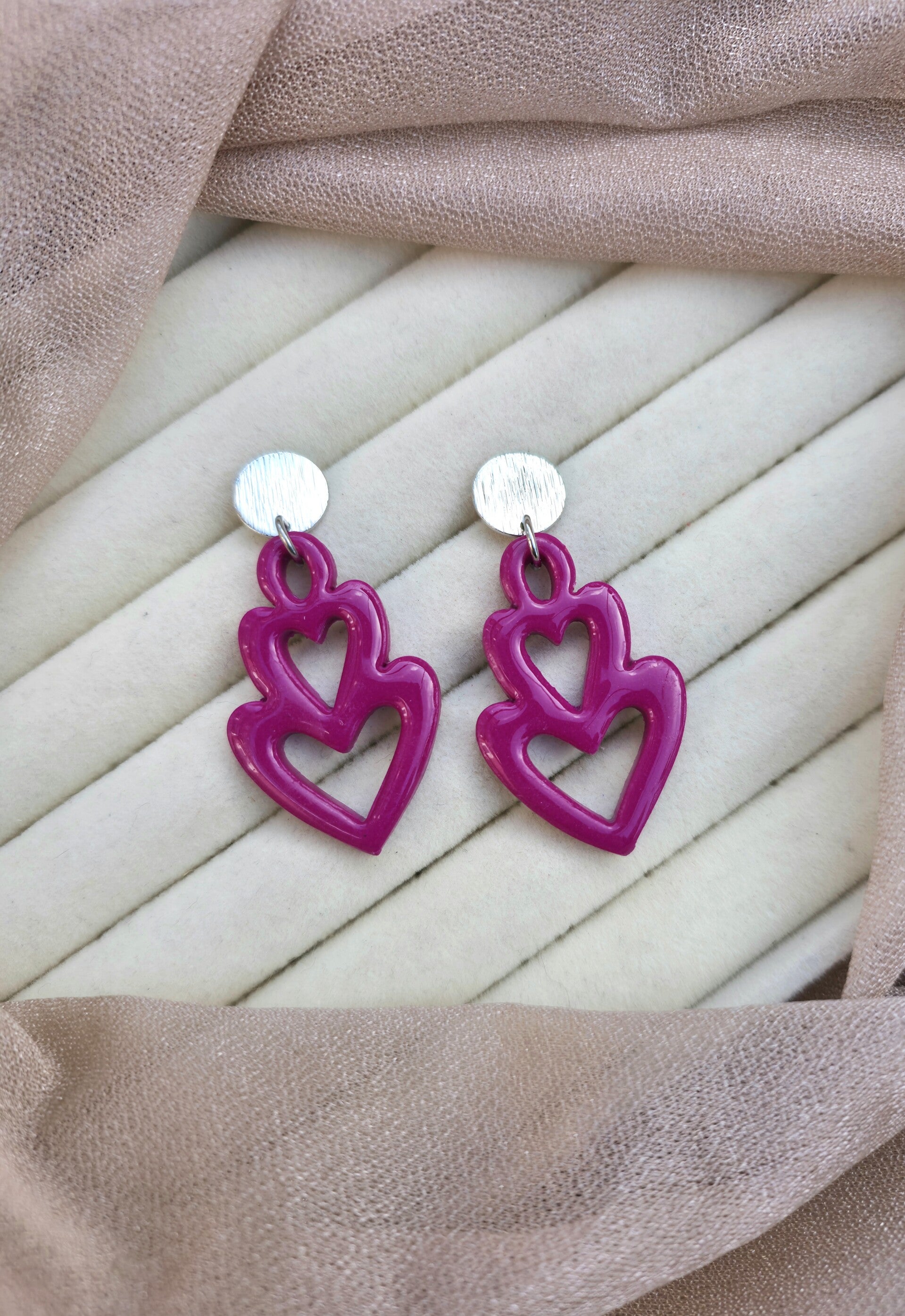 Twin hearts oorbellen