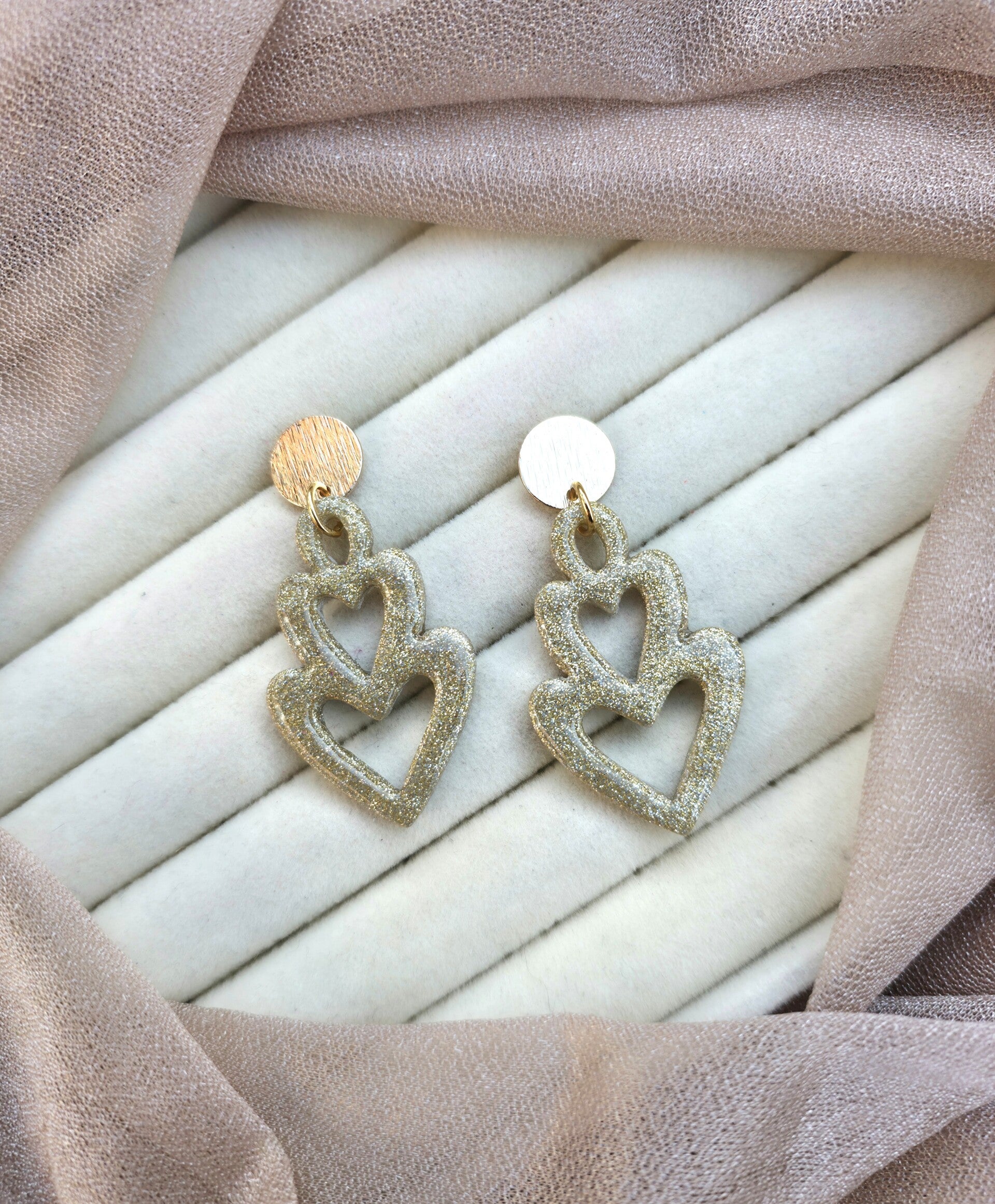 Twin hearts oorbellen