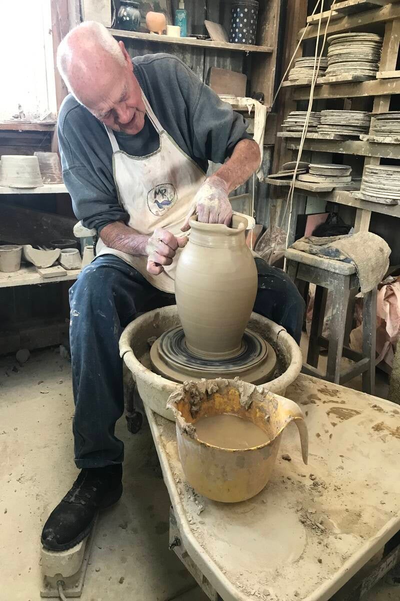 Throwing a pot on the wheel