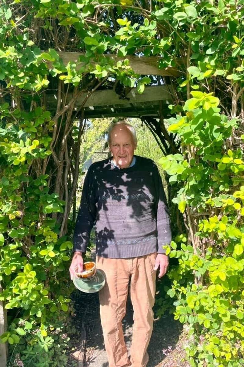 Mac heading to the workshop to make some more pots