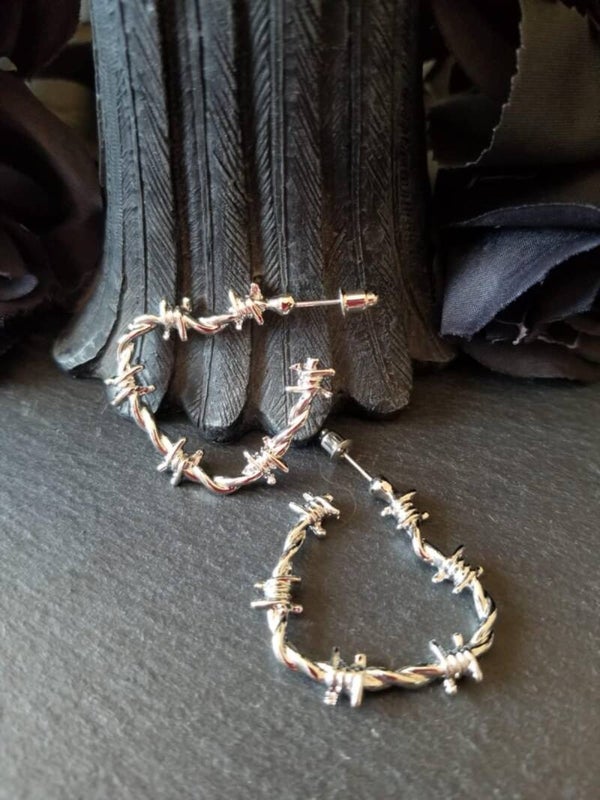 Boucles d'oreilles acier barbelés