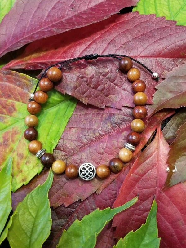 Bracelet bois double cœurs celtiques