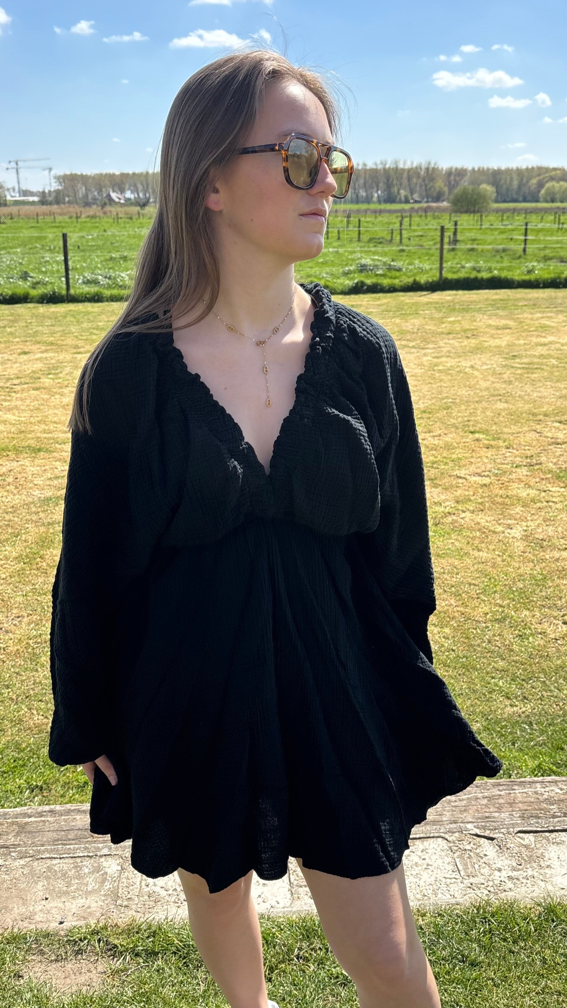 Black dress with batwing sleeves